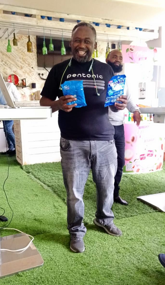 Holding MENTOS packs at the Route Developers seeding launch